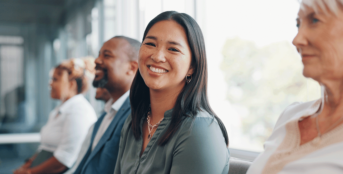 woman in group smiling at camera